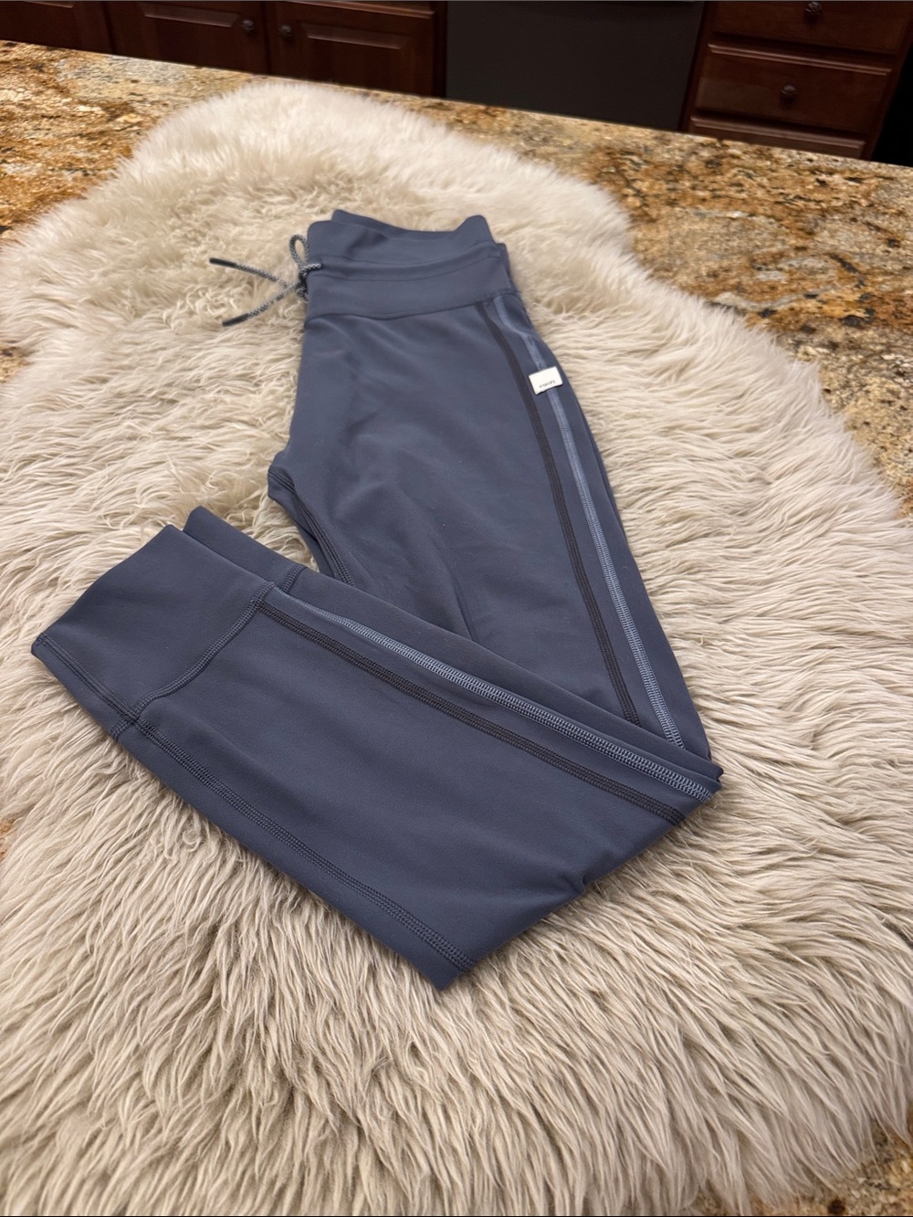 Vuori Daily Leggings. Blueish grey color with pinstripe. Size Small.